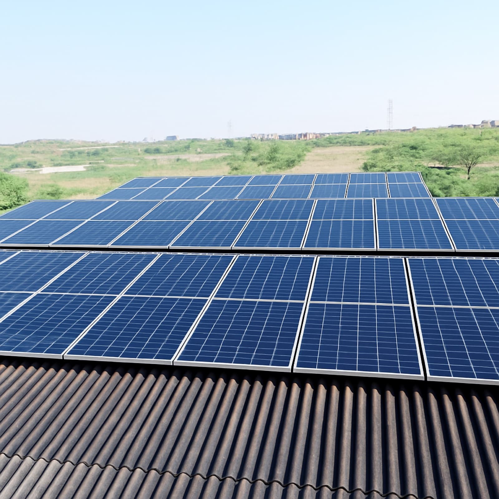 Solar panels over the mill against open fields