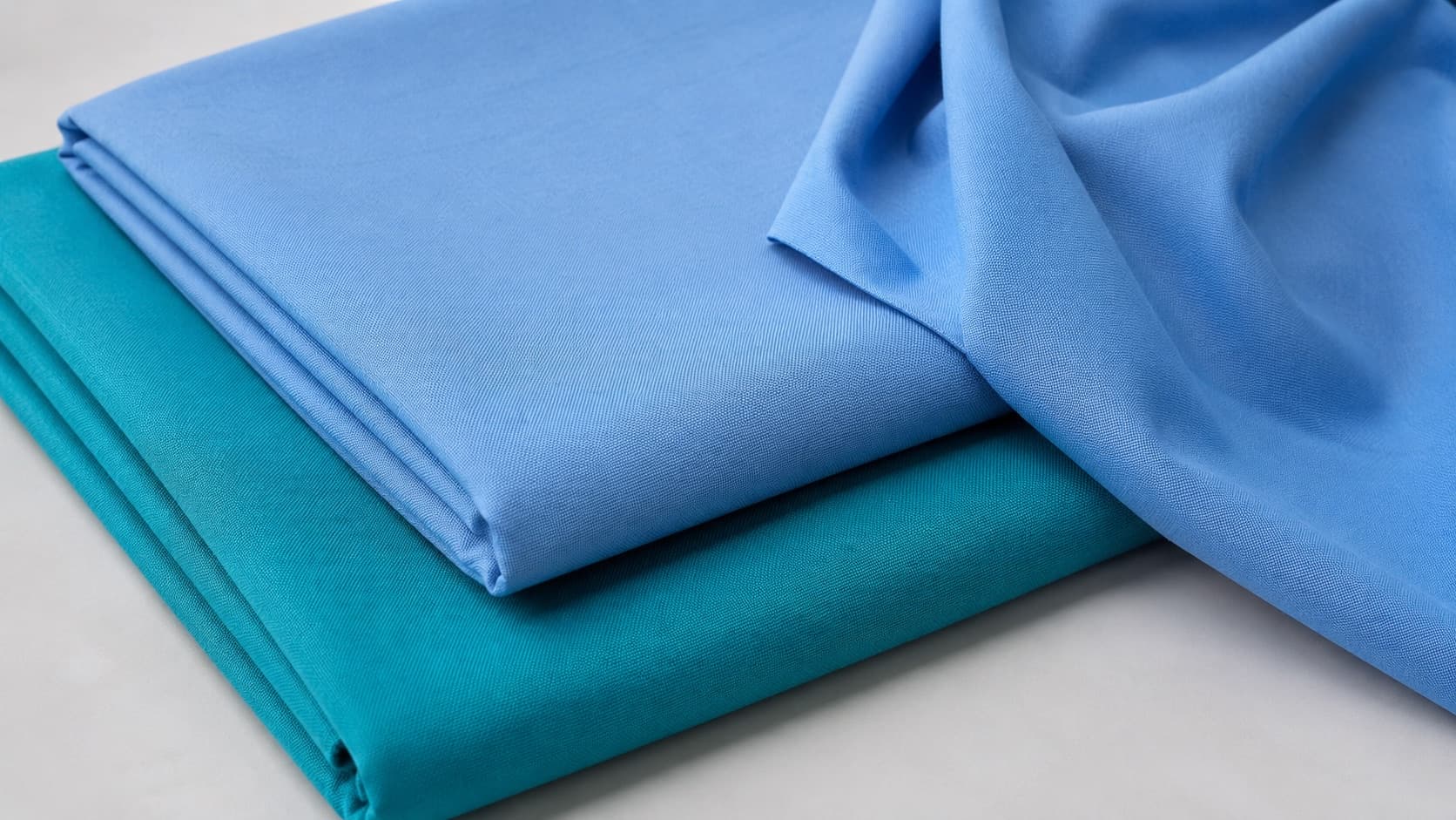Folded blue and teal scrub fabric
