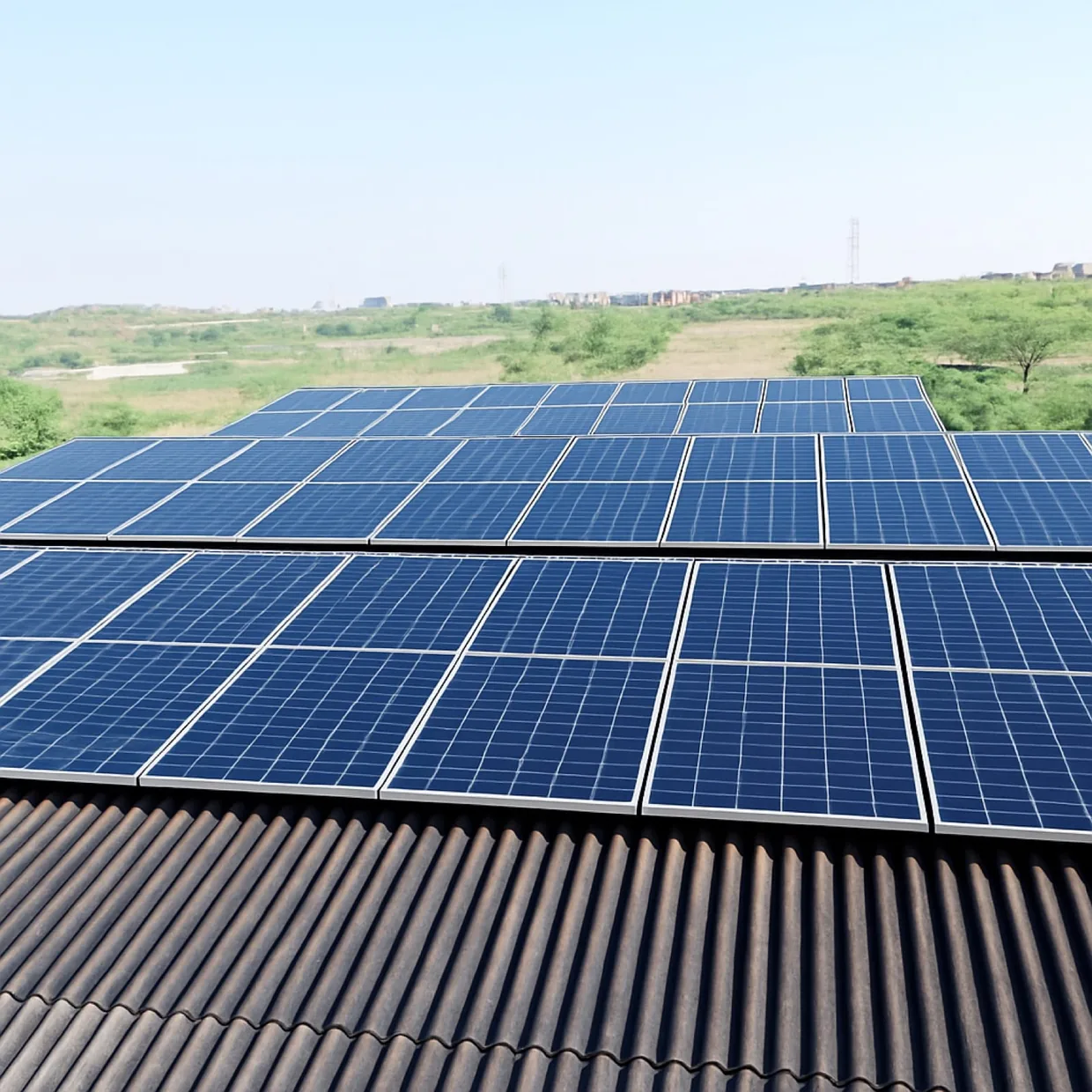 Solar panels installed on mill land alongside open fields