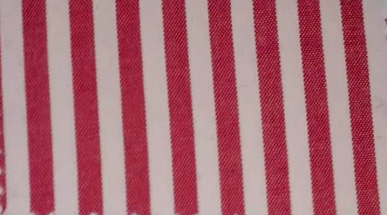 Close-up of navy and white striped hospital staff uniform fabric