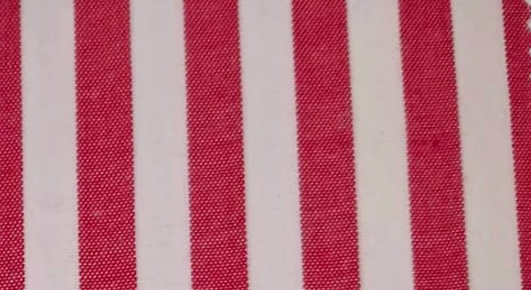 Close-up of purple and white pinstriped hospital staff uniform fabric
