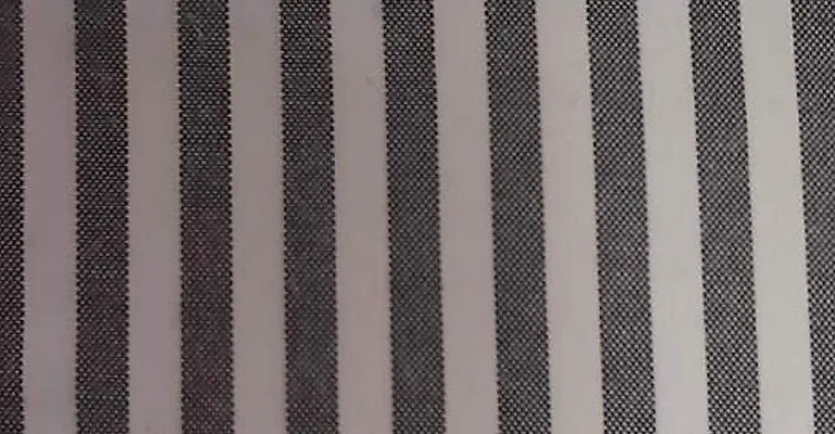 Close-up of grey and black striped hospital staff uniform fabric
