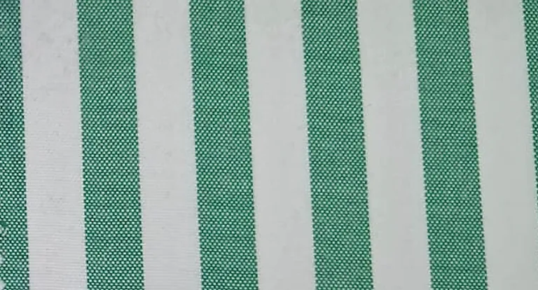 Close-up of green and white striped hospital staff uniform fabric