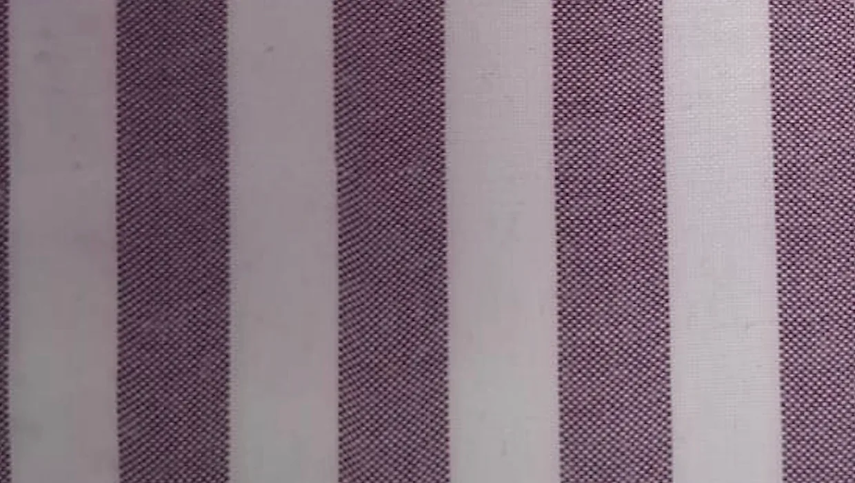 Close-up of purple and white striped hospital staff uniform fabric