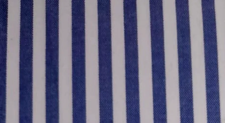 Close-up of blue and white striped hospital staff uniform fabric