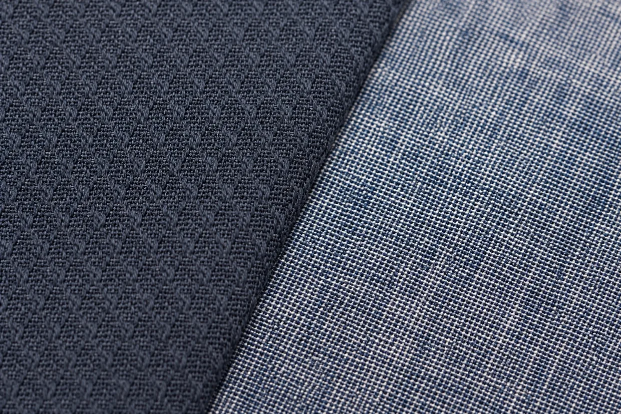 Close-up comparison of dobby weave and chambray weave fabric structures side by side